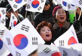 S Korean ruling party asks opposition to amend motion to impeach president